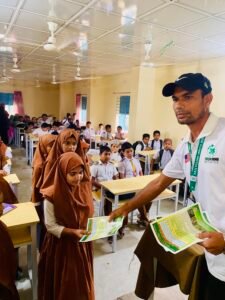 Green Fund Initiative volunteer sharing wildlife conservation information with students in Bangladesh