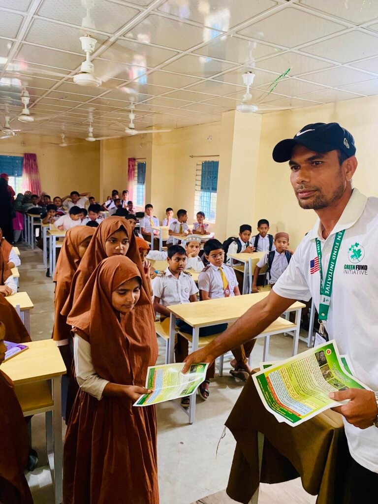 Green Fund Initiative volunteer sharing wildlife conservation information with students in Bangladesh