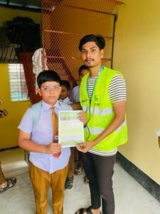 Green Fund Initiative volunteer sharing wildlife conservation information with students in Bangladesh